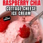 Low carb raspberry chia cottage cheese ice cream in a bowl topped with fresh raspberries pinterest image.