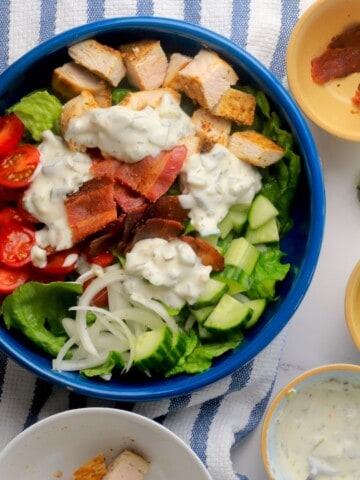 Low carb loaded dill pickle bacon ranch chicken salad in a bowl.
