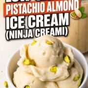 Low carb pistachio almond ice cream in a white bowl.