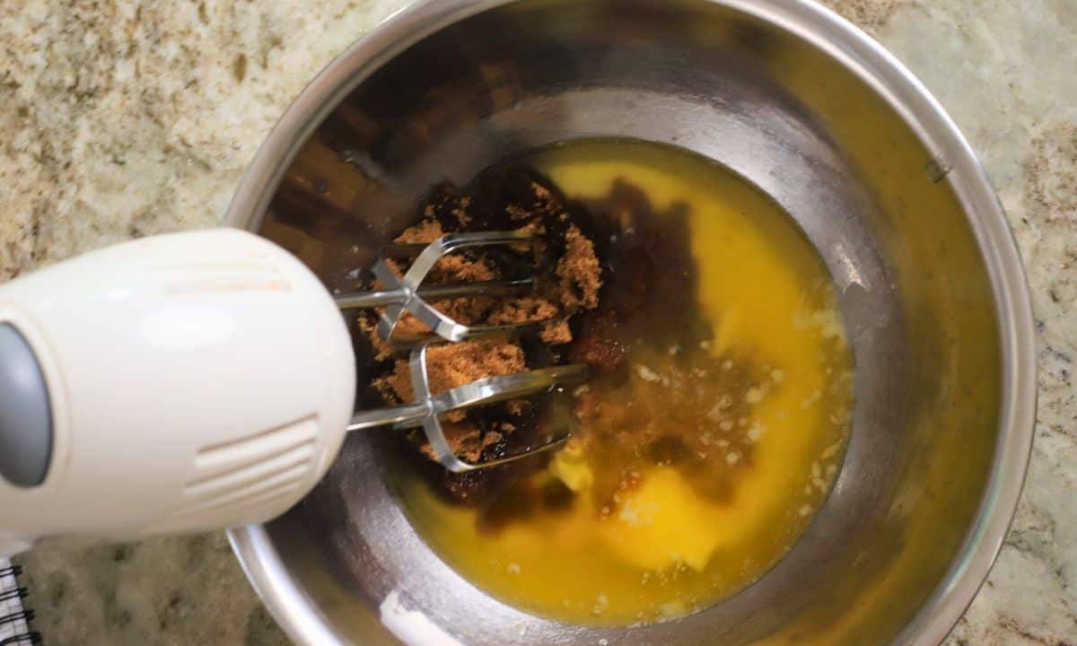 Creaming the brown sweetener with the butter.