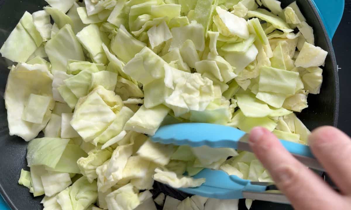 Sauteeing the cabbage.