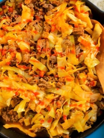 Closeup of the low carb dirty cabbage in a skillet.