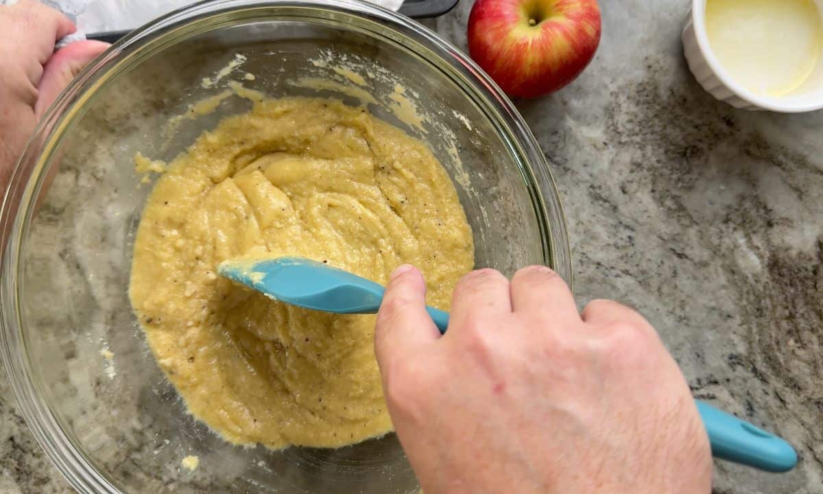 Mixing the batter in a glass bowl.